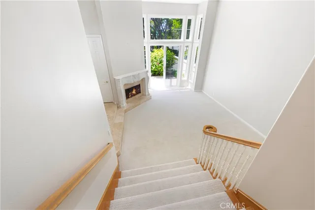 a view of entryway and kitchen
