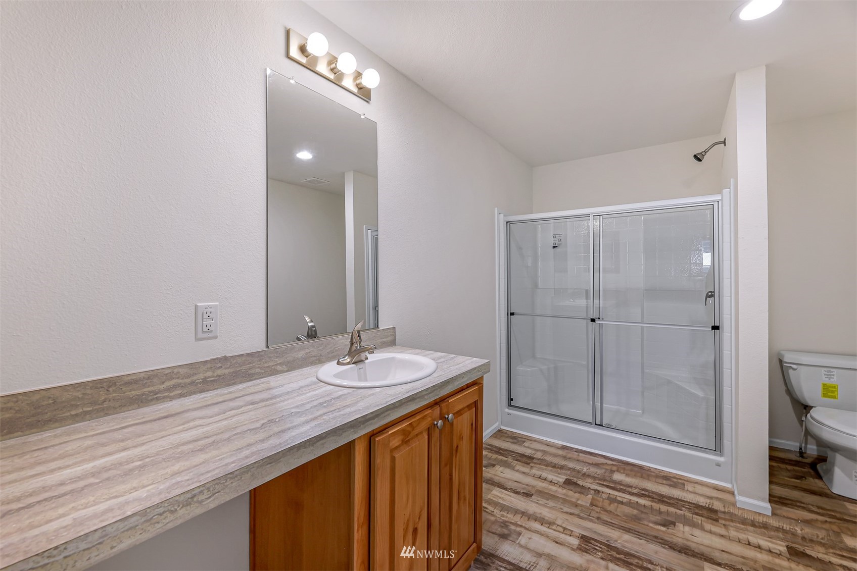 3616 North Red River Road Ferndale, WA 98248 - Photo 17 of 28 a bathroom with a sink and a mirror