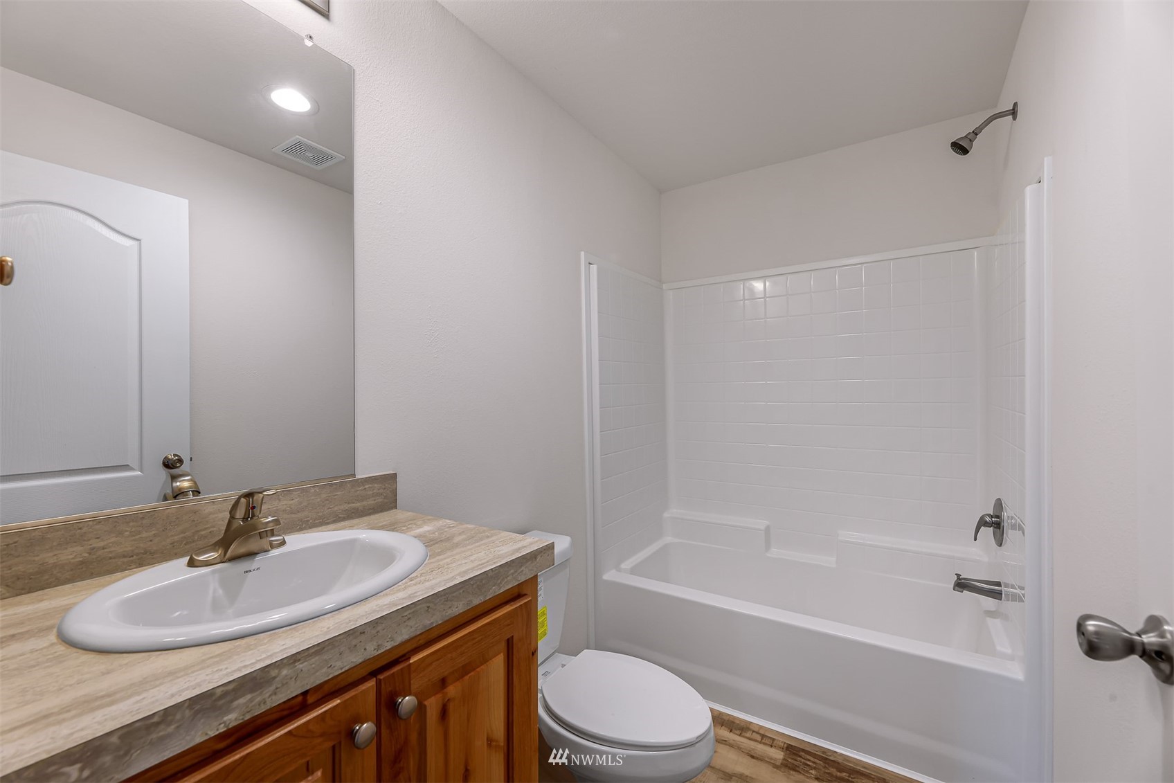 3616 North Red River Road Ferndale, WA 98248 - Photo 21 of 28 a bathroom with a granite countertop sink toilet and shower