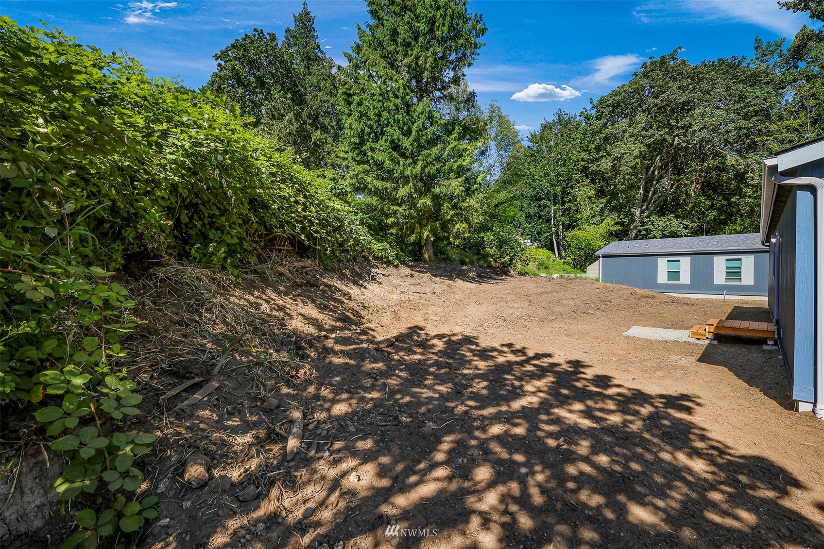 3616 North Red River Road Ferndale, WA 98248 - Photo 24 of 28 a view of a house with a tree