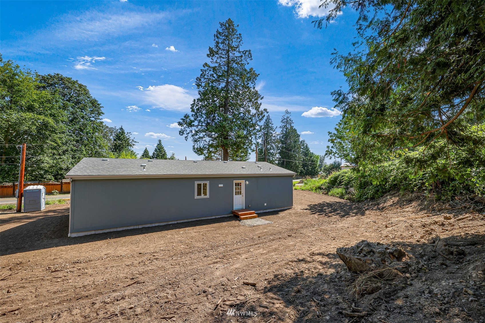 3616 North Red River Road Ferndale, WA 98248 - Photo 25 of 28 a front view of a house with a yard