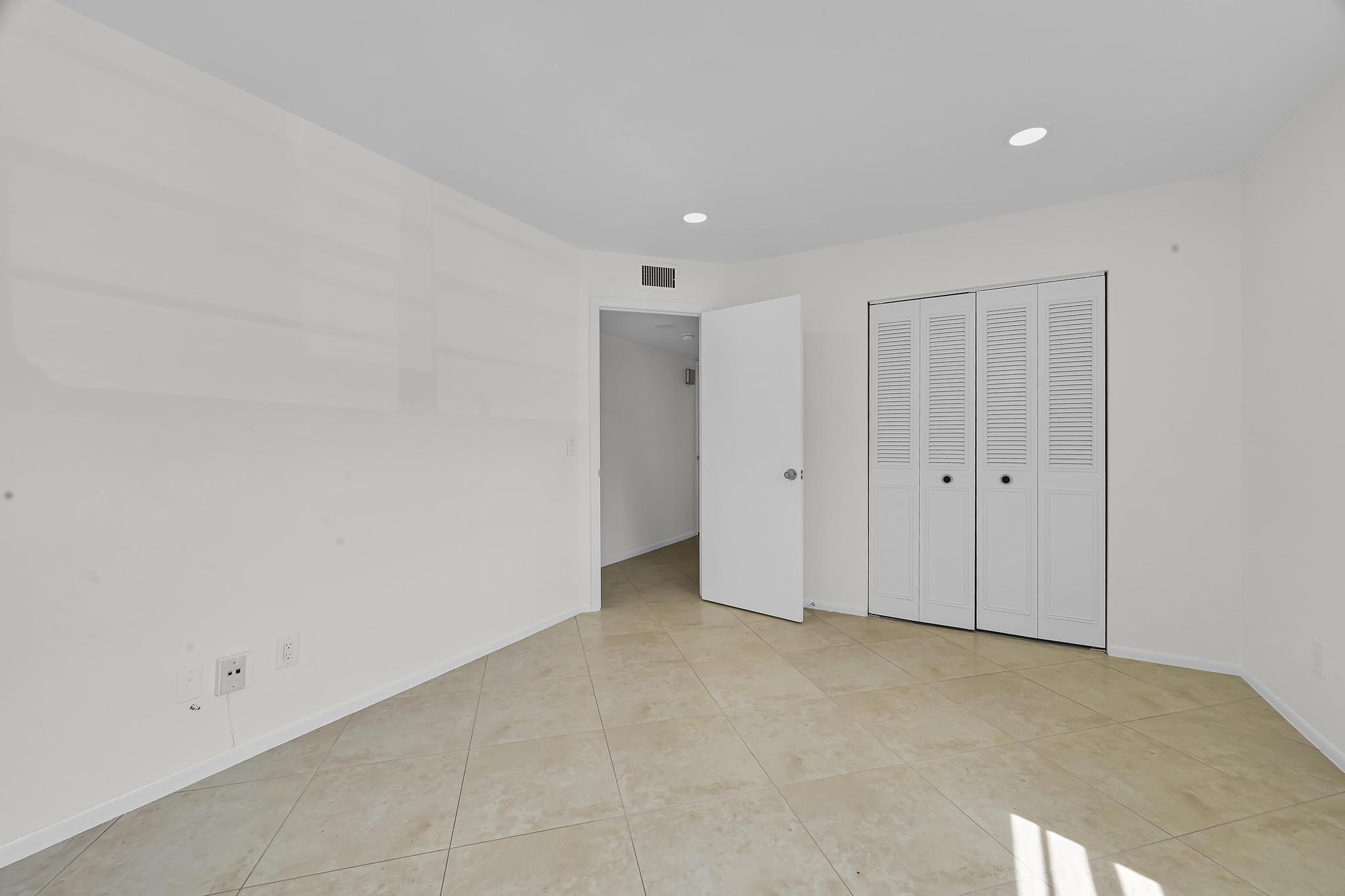 2 Lake Vista Trail, Unit 107 Port St. Lucie, FL 34952 - Photo 13 of 19 a view of an empty room