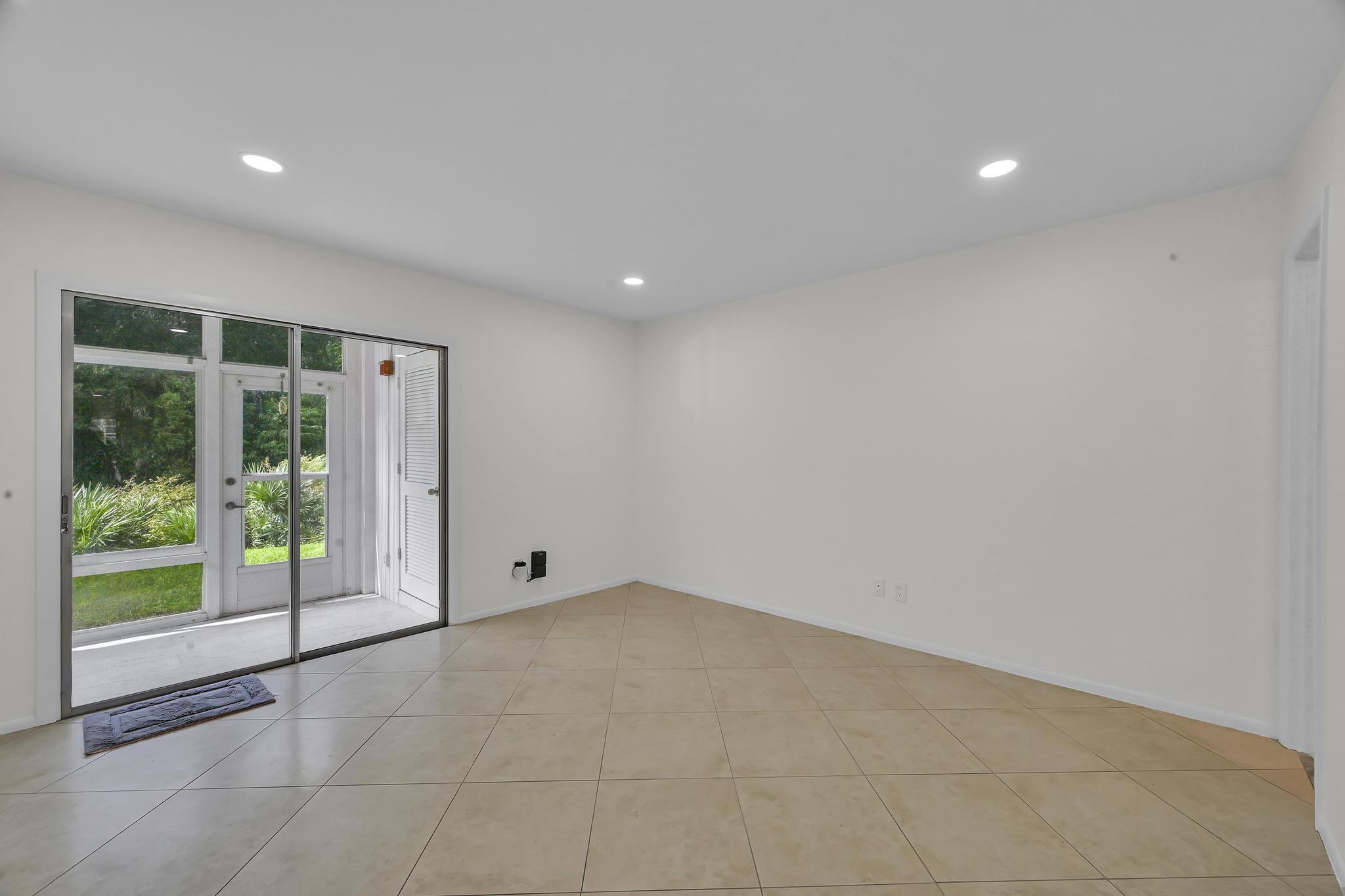2 Lake Vista Trail, Unit 107 Port St. Lucie, FL 34952 - Photo 14 of 19 a view of an empty room with a window