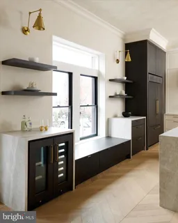 a spacious bedroom with a large bed and a window