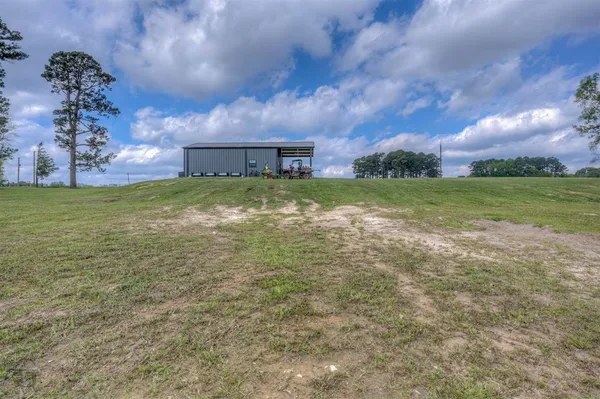 a front view of house with garden