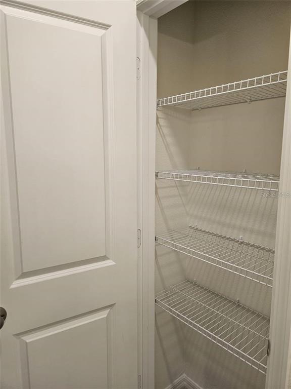 4389 Small Creek Road Kissimmee, FL 34744 - Photo 12 of 17 a close view of washer and dryer