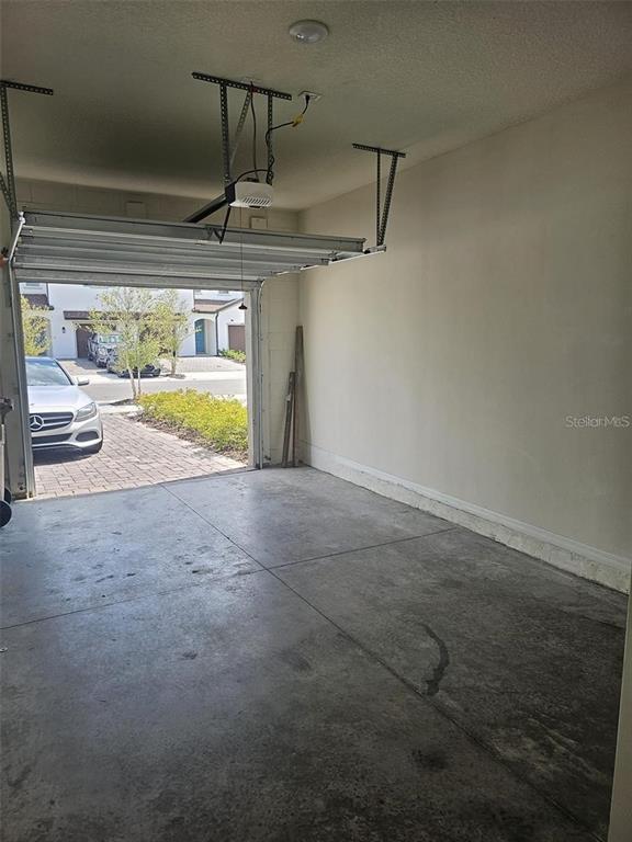 4389 Small Creek Road Kissimmee, FL 34744 - Photo 15 of 17 a view of an indoor swimming pool