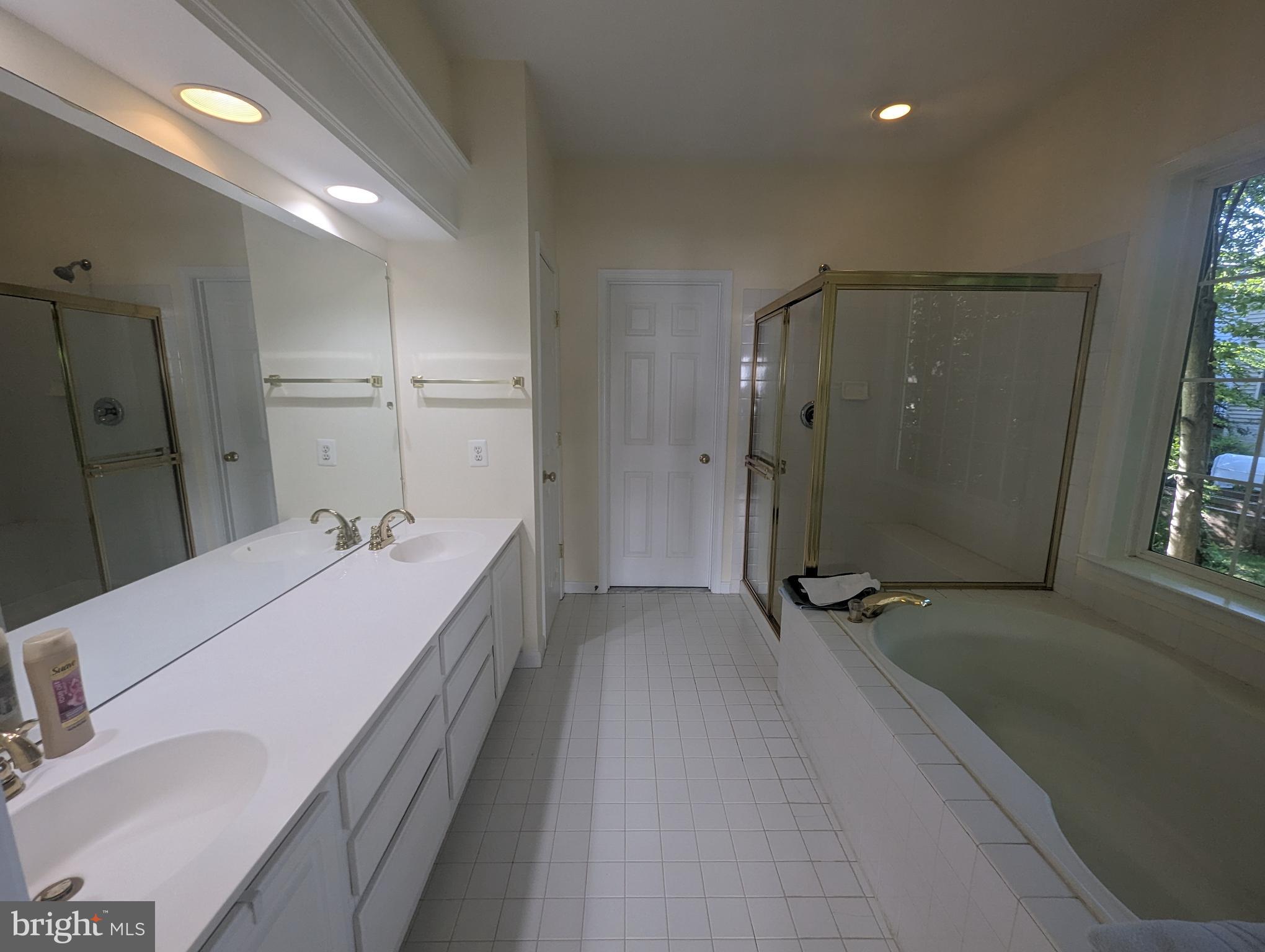 47588 Compton Circle Sterling, VA 20165 - Photo 19 of 38 Master Bedroom/Bath Laundry Room
