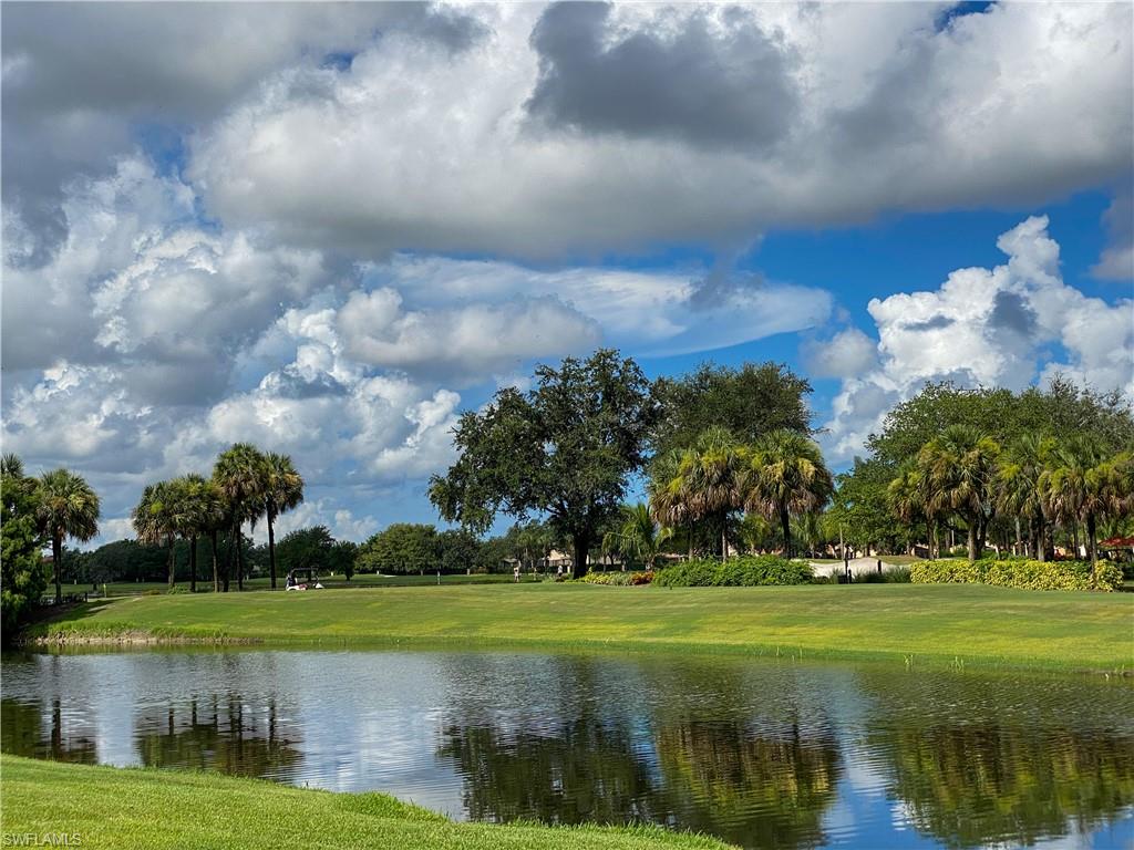 1993 Crestview Way, Unit 129 Naples, FL 34119 - Photo 26 of 26 a view of a lake