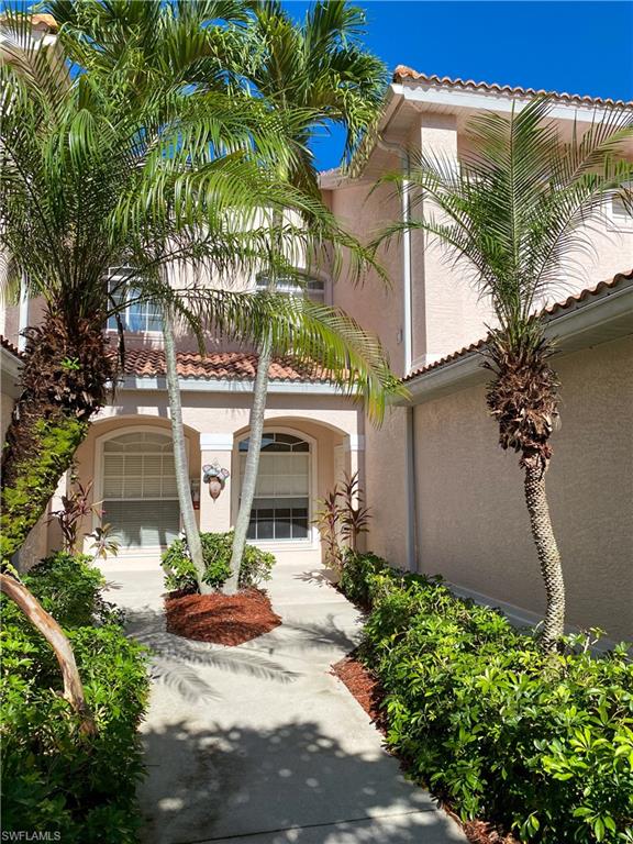 1993 Crestview Way, Unit 129 Naples, FL 34119 - Photo 6 of 26 a view of a house with yard and garden