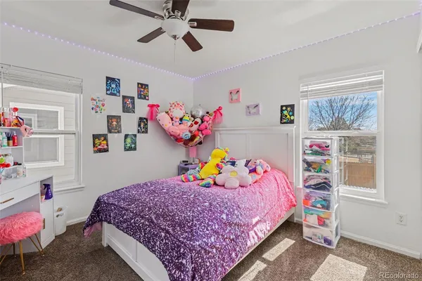 a bedroom with a bed and furniture