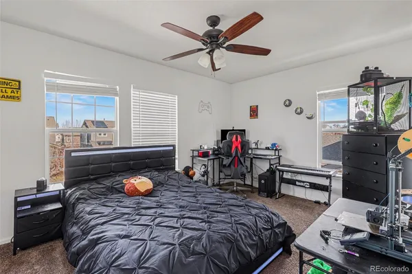 a bed room with a bed and furniture