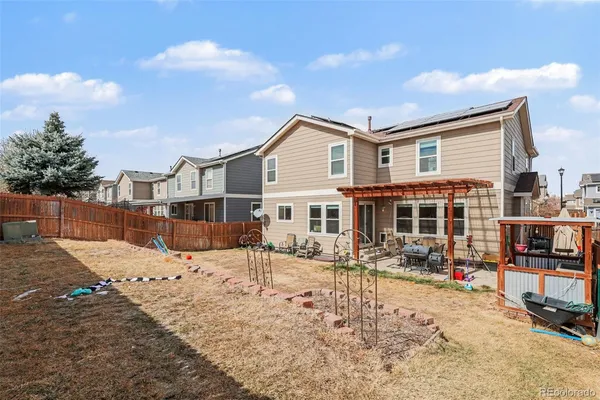 a view of a building with snow on the road