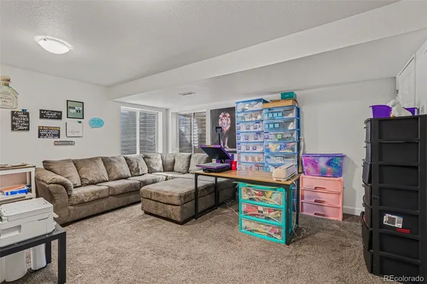 a living room with furniture and a couch