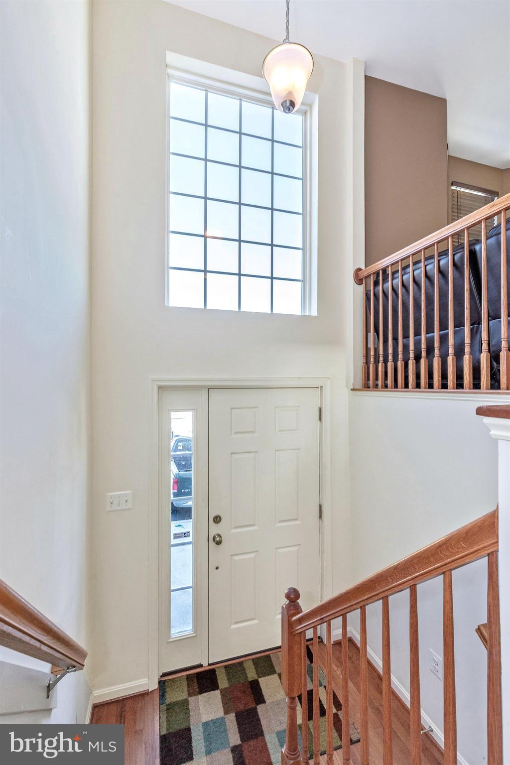 2160 Swains Lock Court Point of Rocks, MD 21777 - Photo 3 of 38 a view of a hallway with windows and chandelier