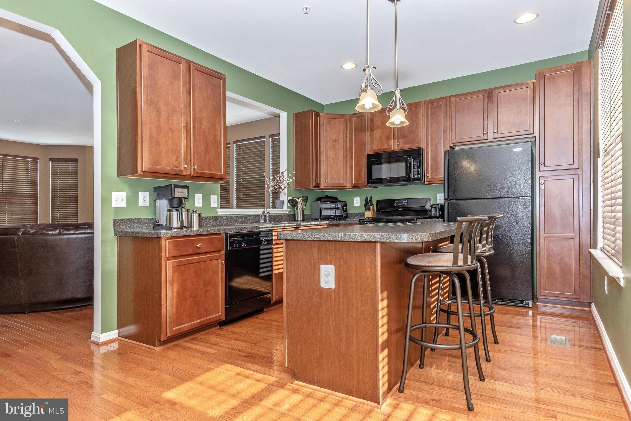 2160 Swains Lock Court Point of Rocks, MD 21777 - Photo 8 of 38 a kitchen with stainless steel appliances granite countertop a refrigerator a stove top oven a sink and dishwasher
