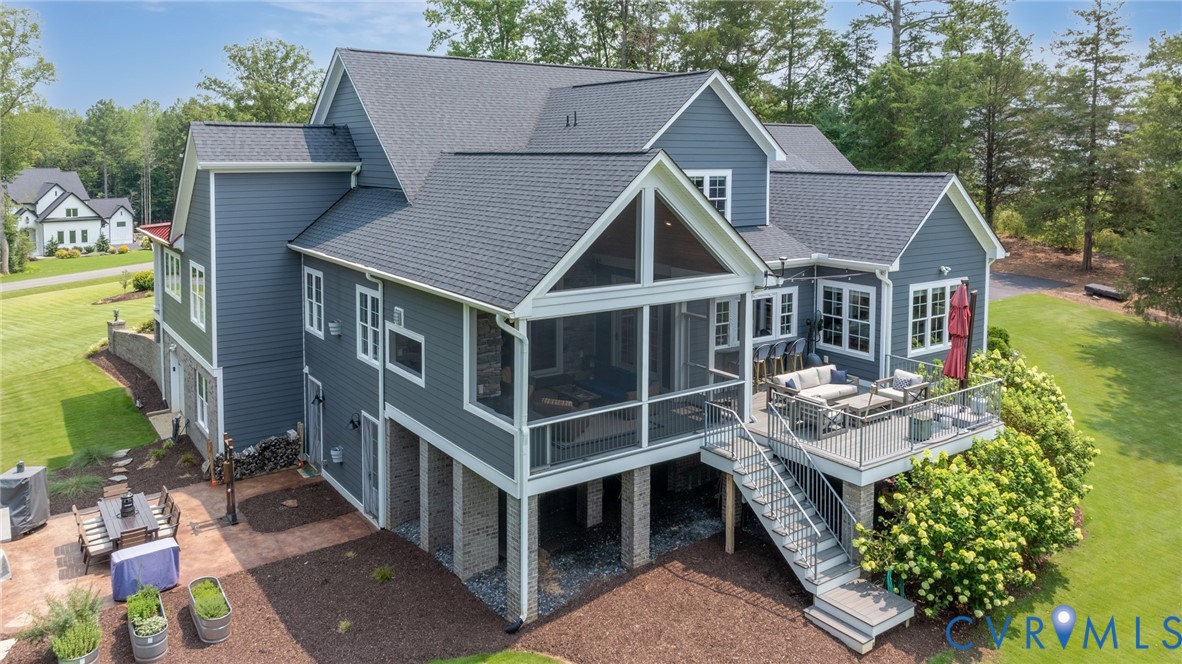 2122 Jockey Ridge Road Maidens, VA 23102 - Photo 50 of 63 an aerial view of a house with roof deck front of house