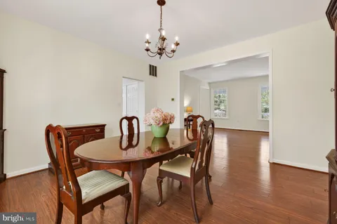 a bathroom with a double vanity sink and mirror