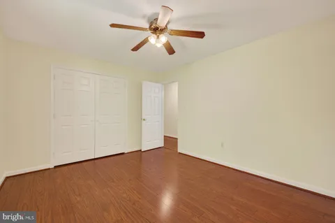 a big house with yard in front of it