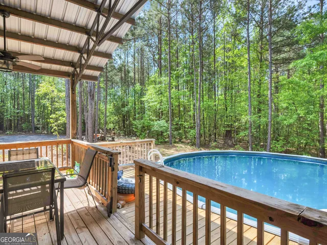 a view of a two chairs in the roof deck