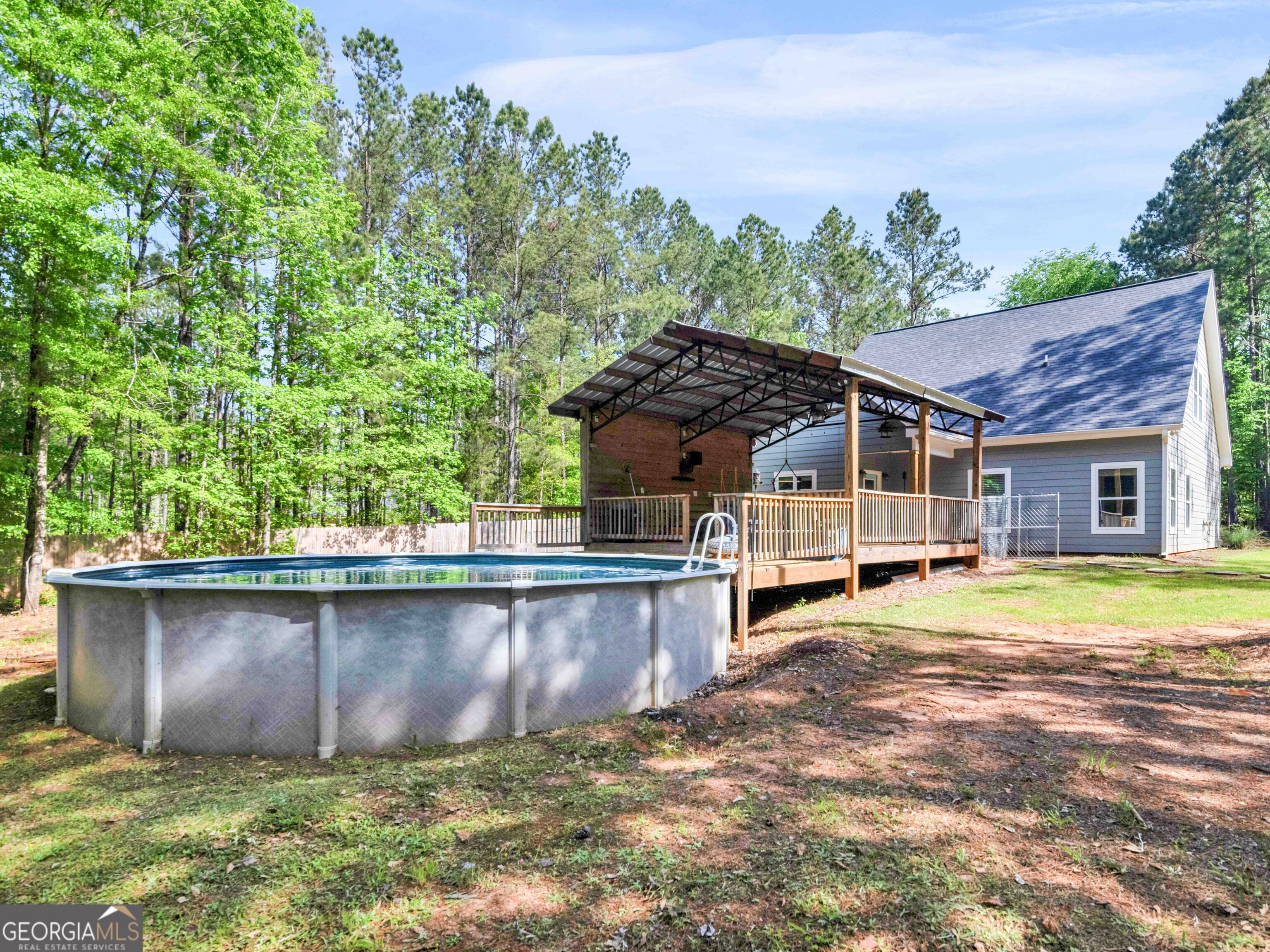180 Preservation Avenue Jackson, GA 30233 - Photo 26 of 27 a view of a house with a yard and sitting area