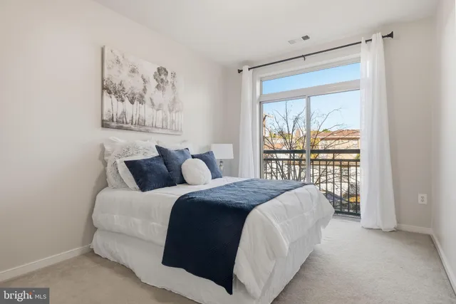 a view of living room kitchen and furniture