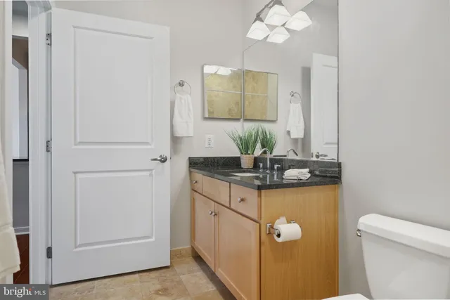a view of a living room with a wooden floor