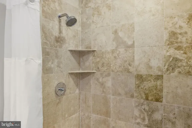 a living room with a couch and a table