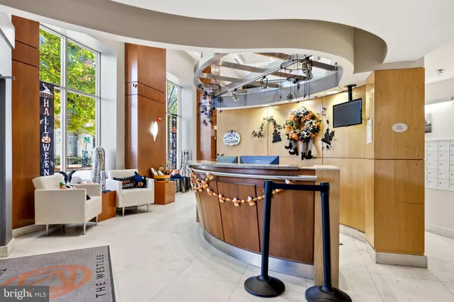 a view of a chairs and tables in the back yard of the house