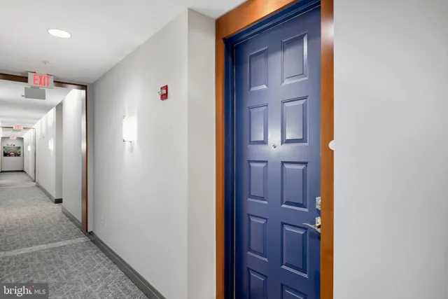 a view of a workspace with furniture