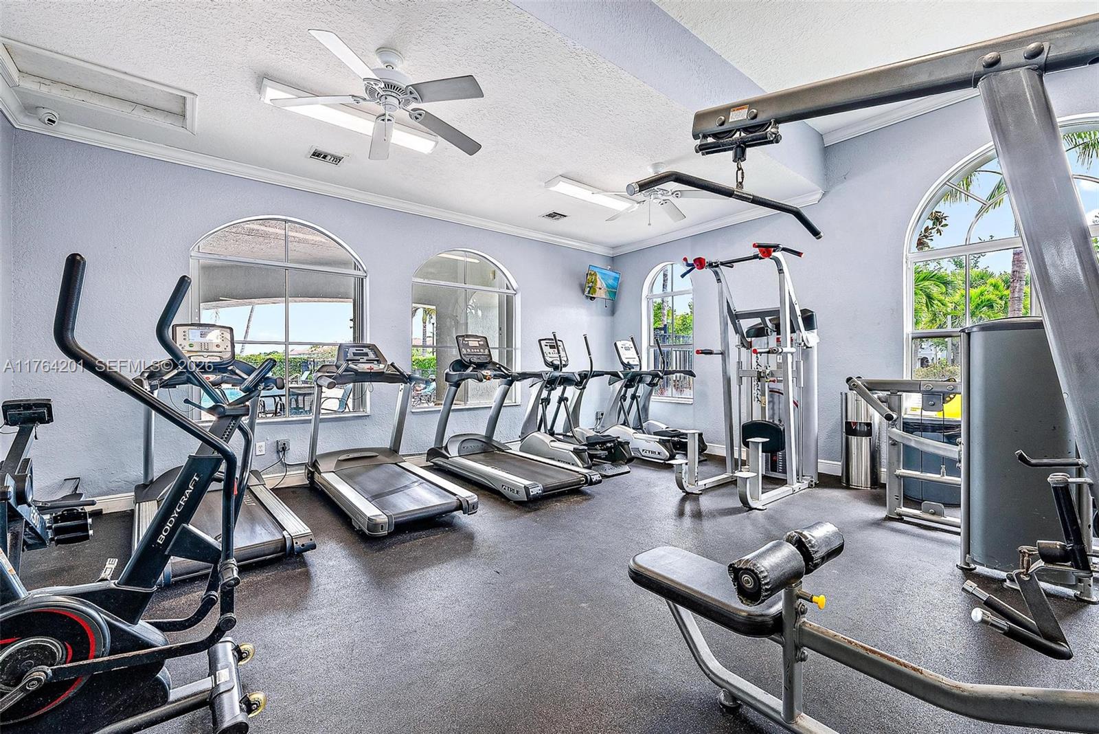 3229 Laurel Ridge Circle, Unit 3229 Riviera Beach, FL 33404 - Photo 18 of 24 a view of a room with gym equipment