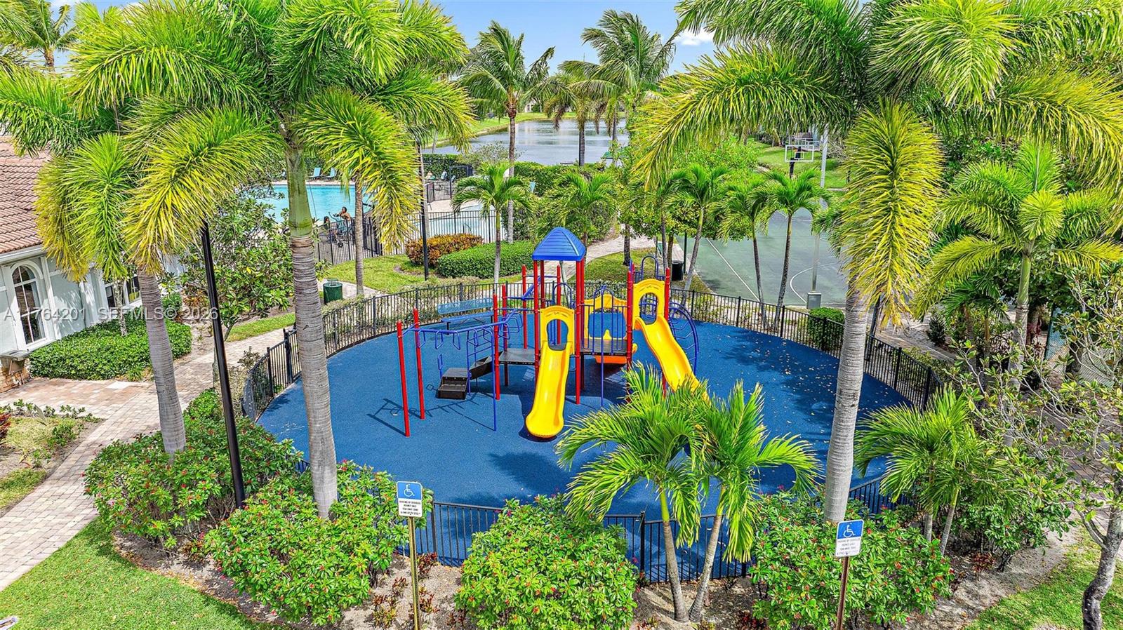 3229 Laurel Ridge Circle, Unit 3229 Riviera Beach, FL 33404 - Photo 20 of 24 a view of outdoor space with a swimming pool