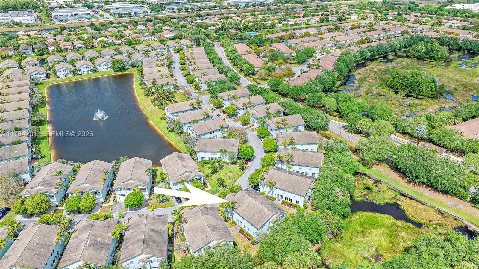 3229 Laurel Ridge Circle, Unit 3229 Riviera Beach, FL 33404 - Photo 22 of 24 an aerial view of residential houses with outdoor space