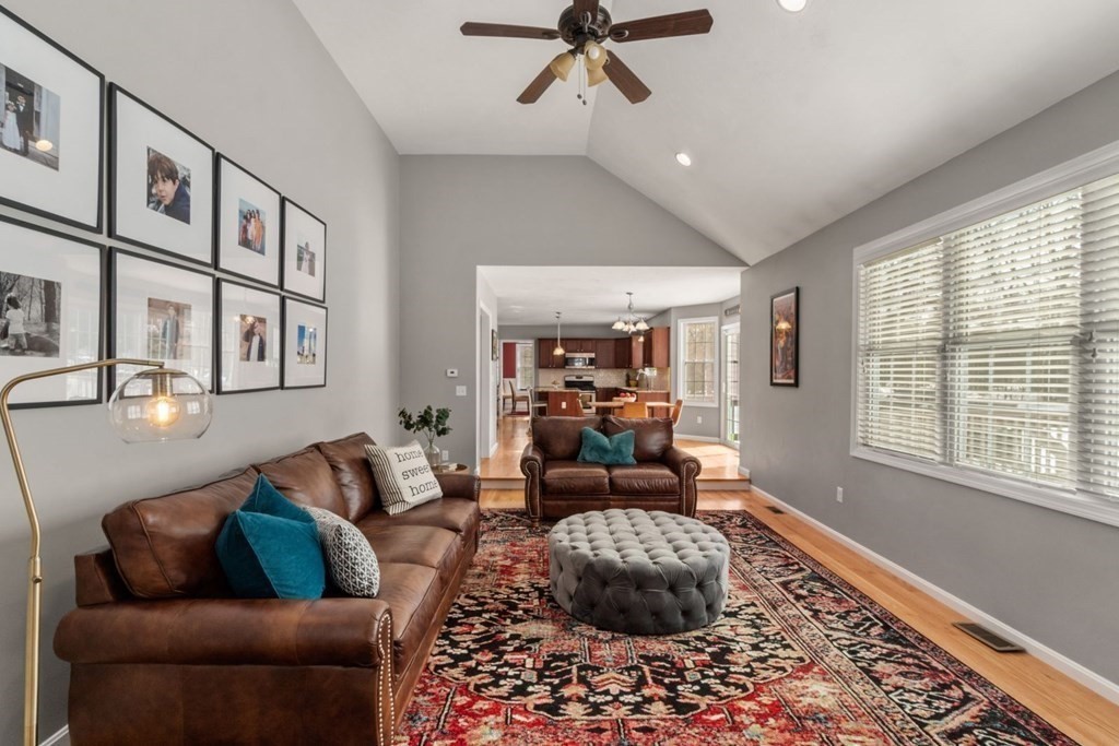 16 Michael Road Franklin, MA 02038 - Photo 17 of 39 a living room with furniture and a rug