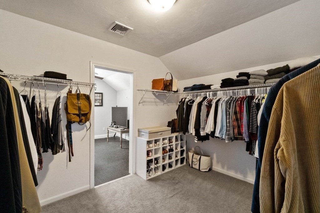16 Michael Road Franklin, MA 02038 - Photo 24 of 39 a view of walk in closet with clothes and shoes