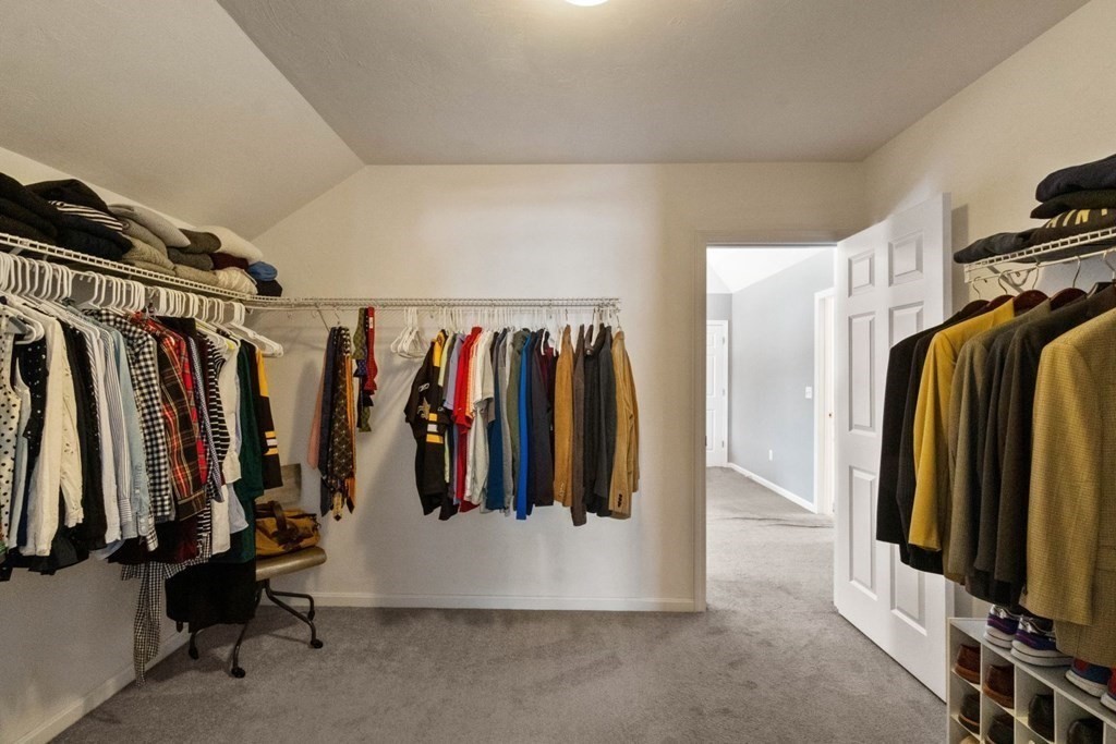 16 Michael Road Franklin, MA 02038 - Photo 25 of 39 a view of walk in closet with clothes and shoes