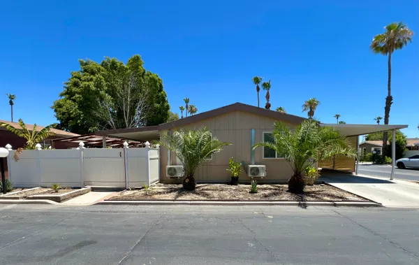 front view of a house with a street