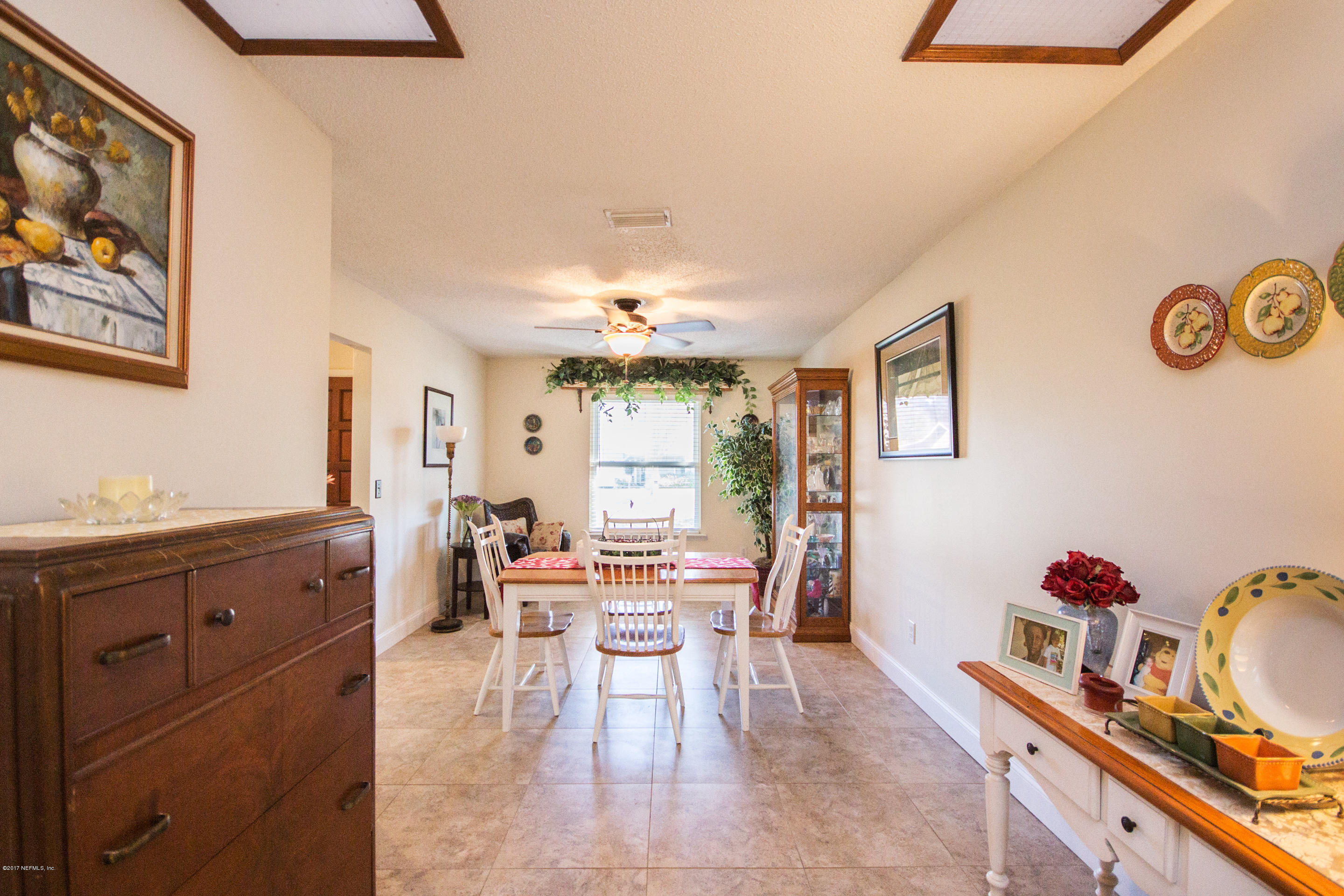 10934 Reading Road Jacksonville, FL 32257 - Photo 6 of 32 a view of a dining room with furniture