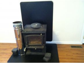 924-922 Bayless Road Jonesborough, TN 37659 - Photo 20 of 24 Garage Home Wood Stove
