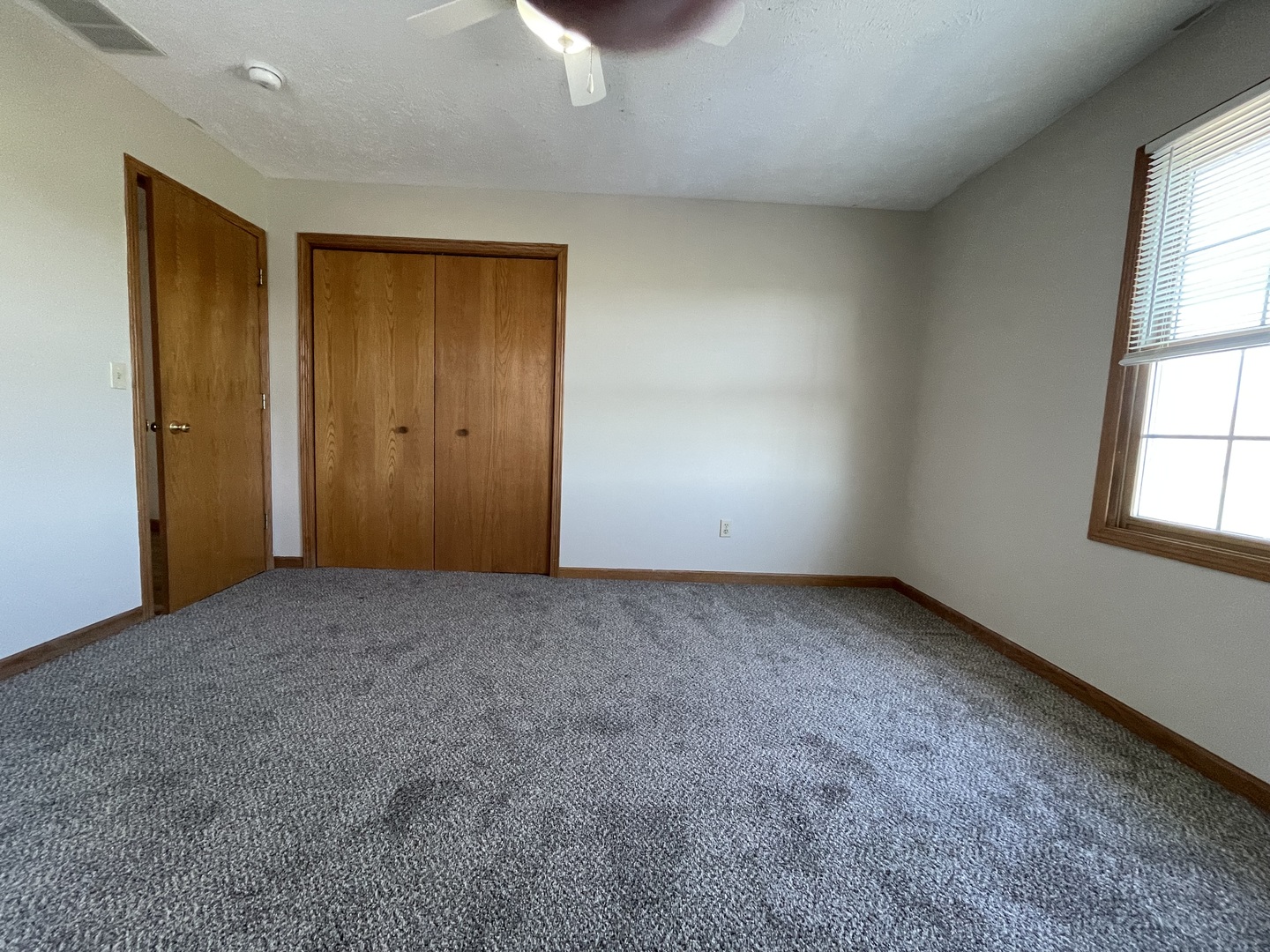 426 South Peace Road, Unit 426 Sycamore, IL 60178 - Photo 21 of 22 an empty room with windows