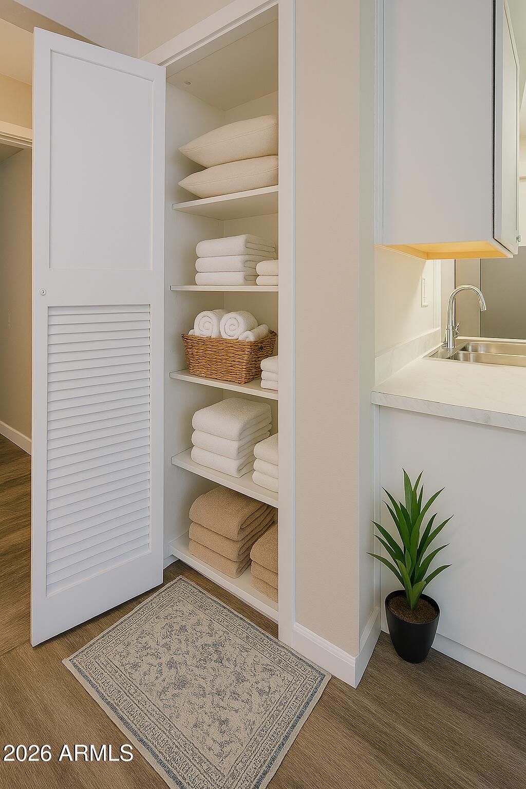 2247 East Cactus Road, Unit 2 Phoenix, AZ 85022 - Photo 11 of 15 11 Staged Linen Closet