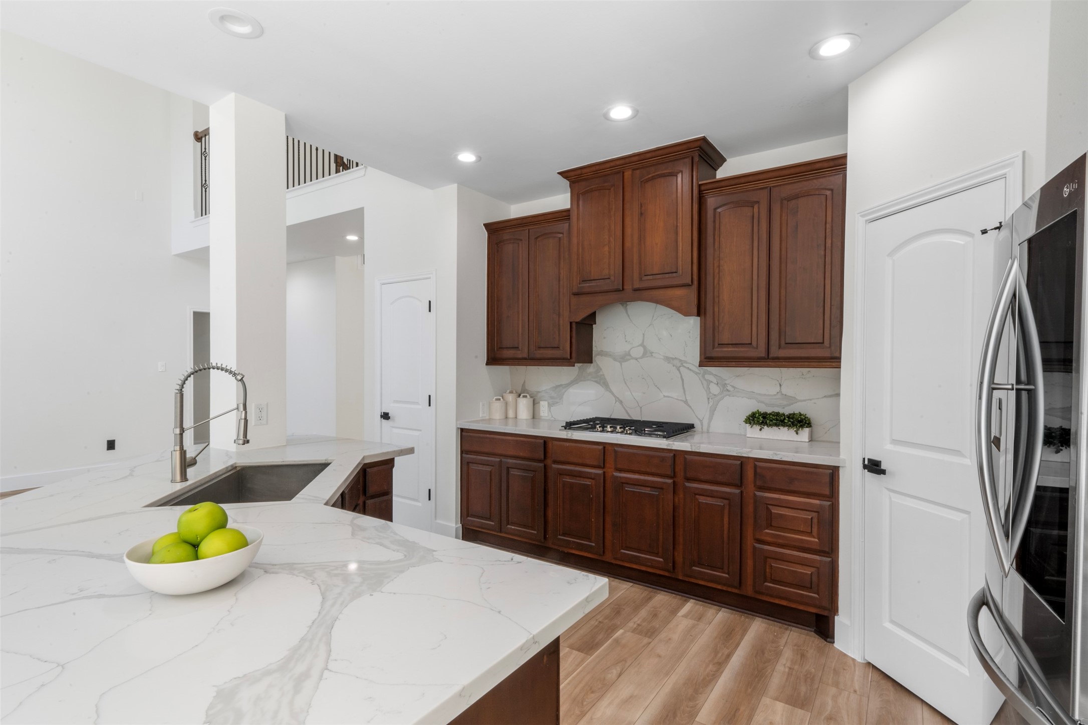 26422 Red Cliff Ridge Katy, TX 77494 - Photo 11 of 40 Plenty of over-head lighting makes food prep and clean-up easy. Walk-in pantry for all your non-parishables!