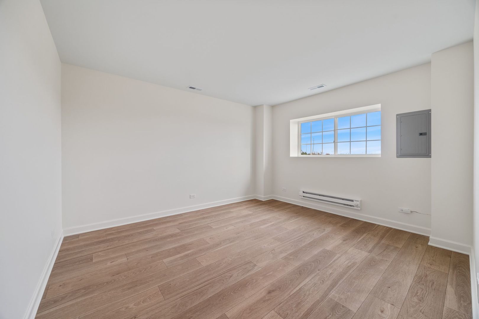 2463 BELLA Drive Pingree Grove, IL 60140 - Photo 23 of 24 a view of an empty room with wooden floor and a window
