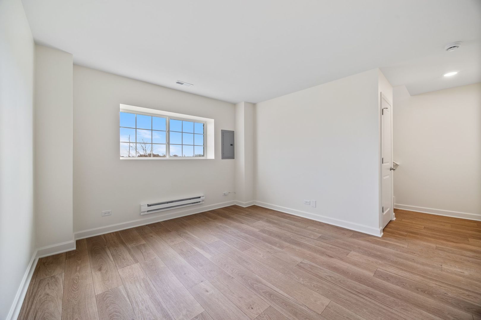 2463 BELLA Drive Pingree Grove, IL 60140 - Photo 24 of 24 an empty room with wooden floor and windows