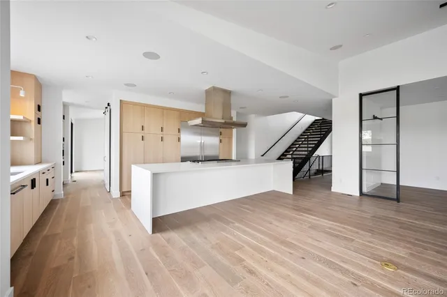 a kitchen with granite countertop a sink and a window