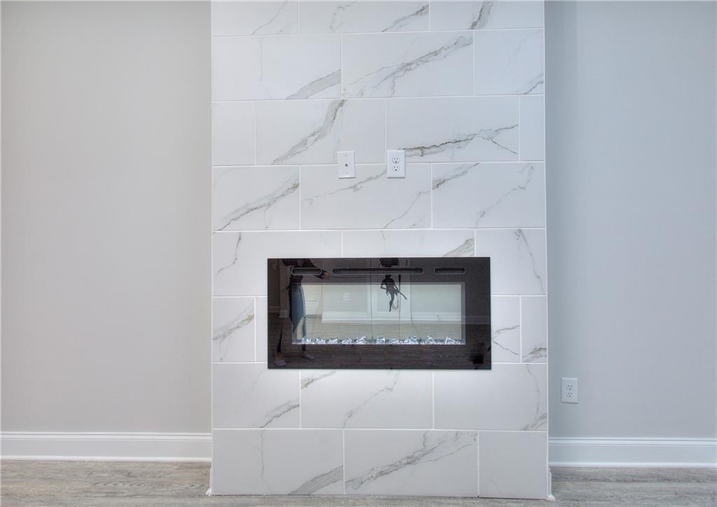 104 Greenview Court Homer, GA 30547 - Photo 26 of 33 a stone house with a hallway