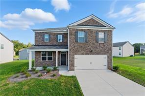 6753 Chilkat Court Southwest Atlanta, GA 30331 - Photo 1 of 16 a front view of a house with garden