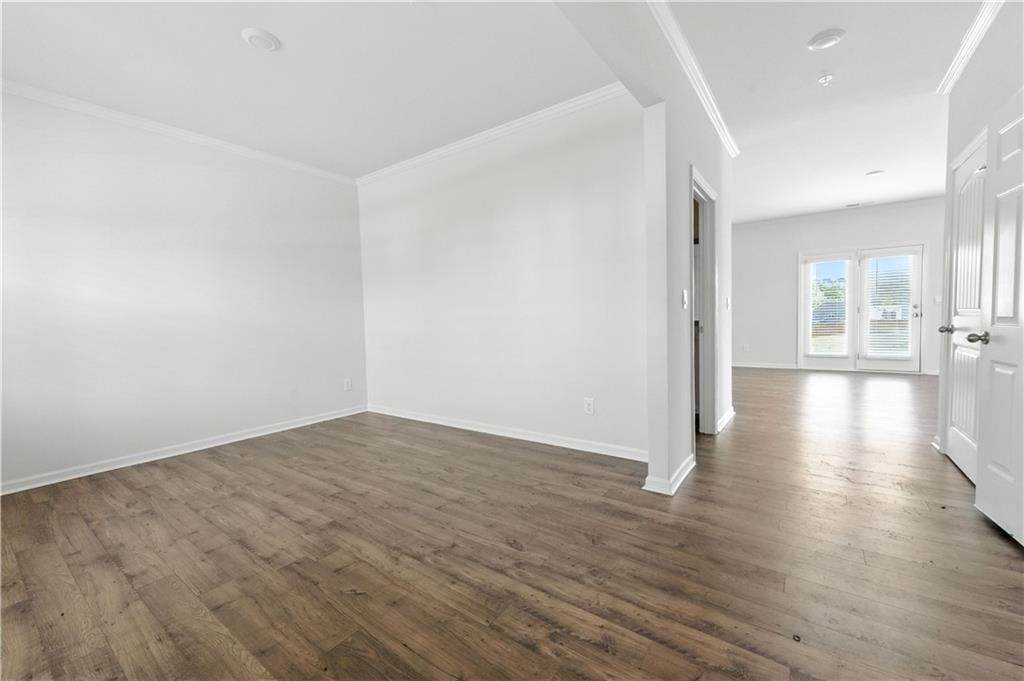 6753 Chilkat Court Southwest Atlanta, GA 30331 - Photo 12 of 16 a view of a room with wooden floor