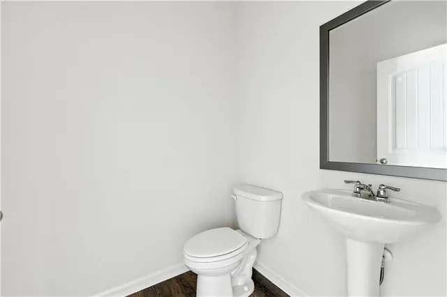 a bathroom with a sink and a toilet