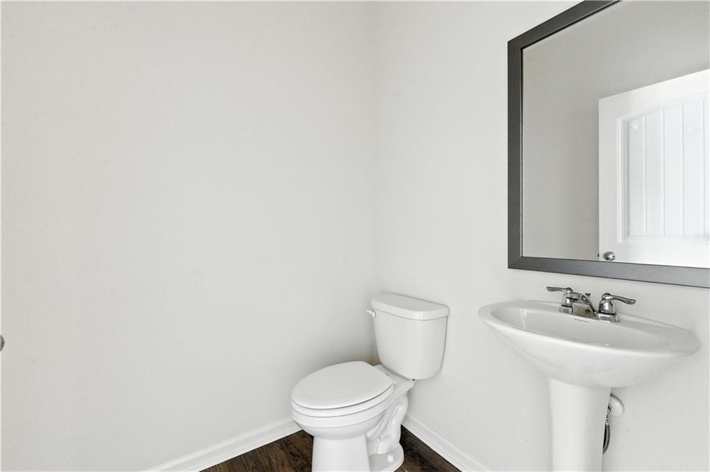 6753 Chilkat Court Southwest Atlanta, GA 30331 - Photo 15 of 16 a bathroom with a sink and a toilet